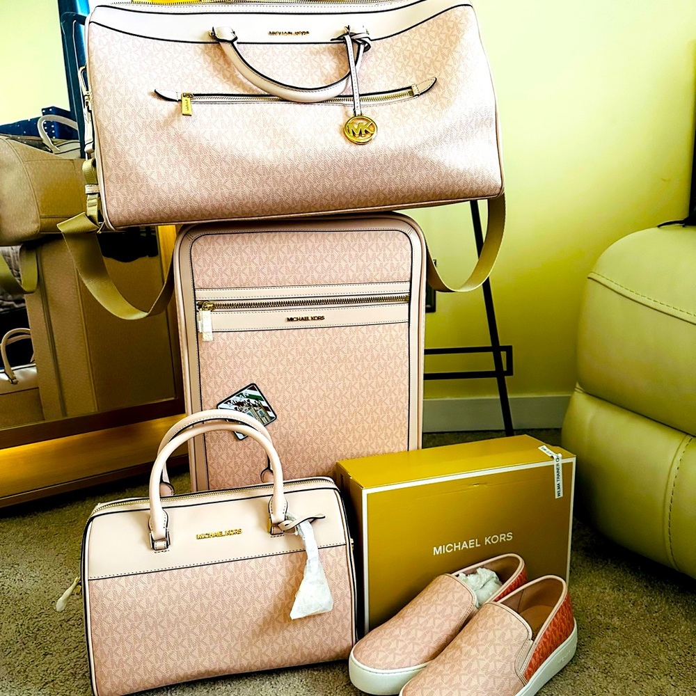 Used with tags MK travel/luggage set